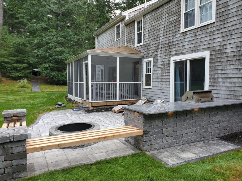 Masonry pillars and seat walls defining a Duxbury patio