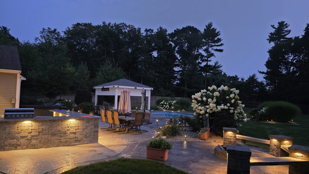 Wide evening view across the Halifax patio and pool landscape