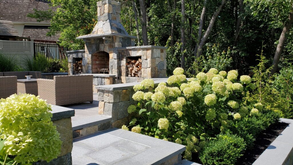 Hingham masonry and planting details beside the patio steps
