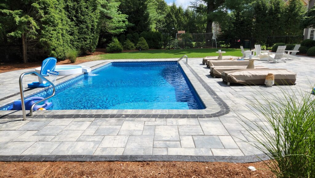 Poolside view across the Mansfield patio and spa
