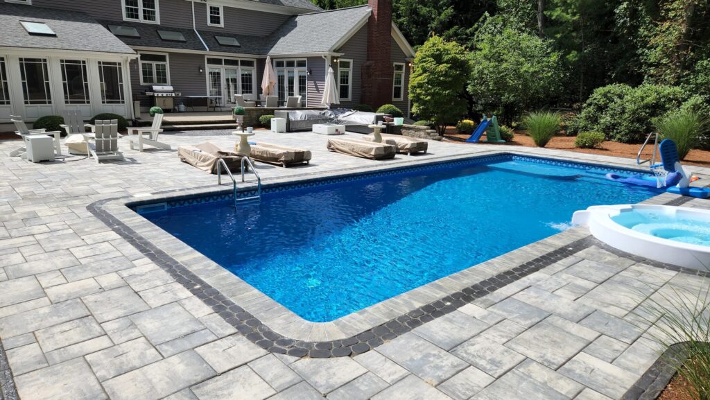Complete Mansfield pool patio viewed from the spa side