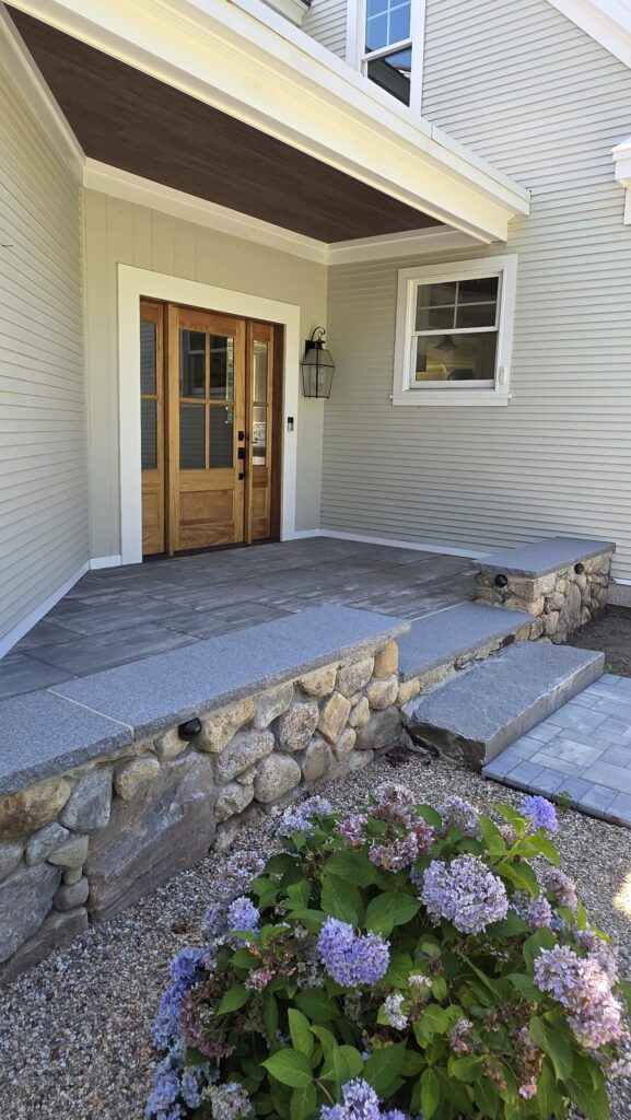 Vertical view of the Norwell stone-edged entry and planting