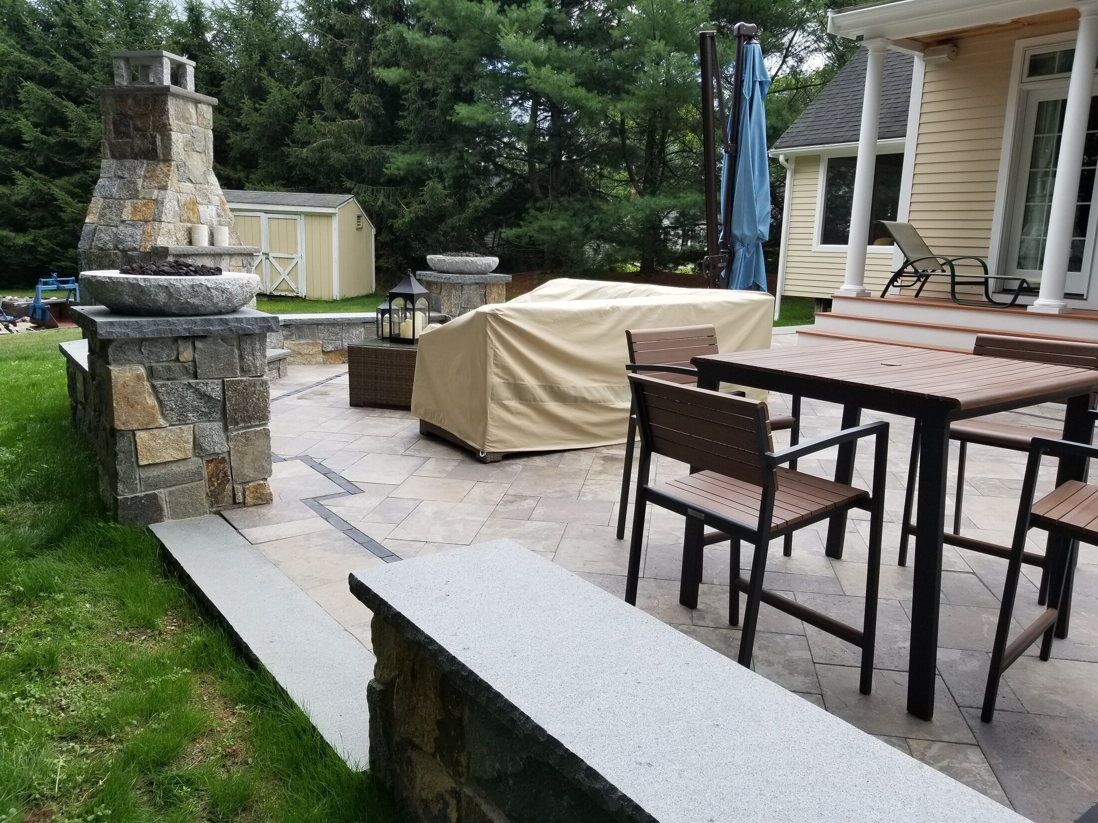 Easton patio with masonry fireplace and gathering area