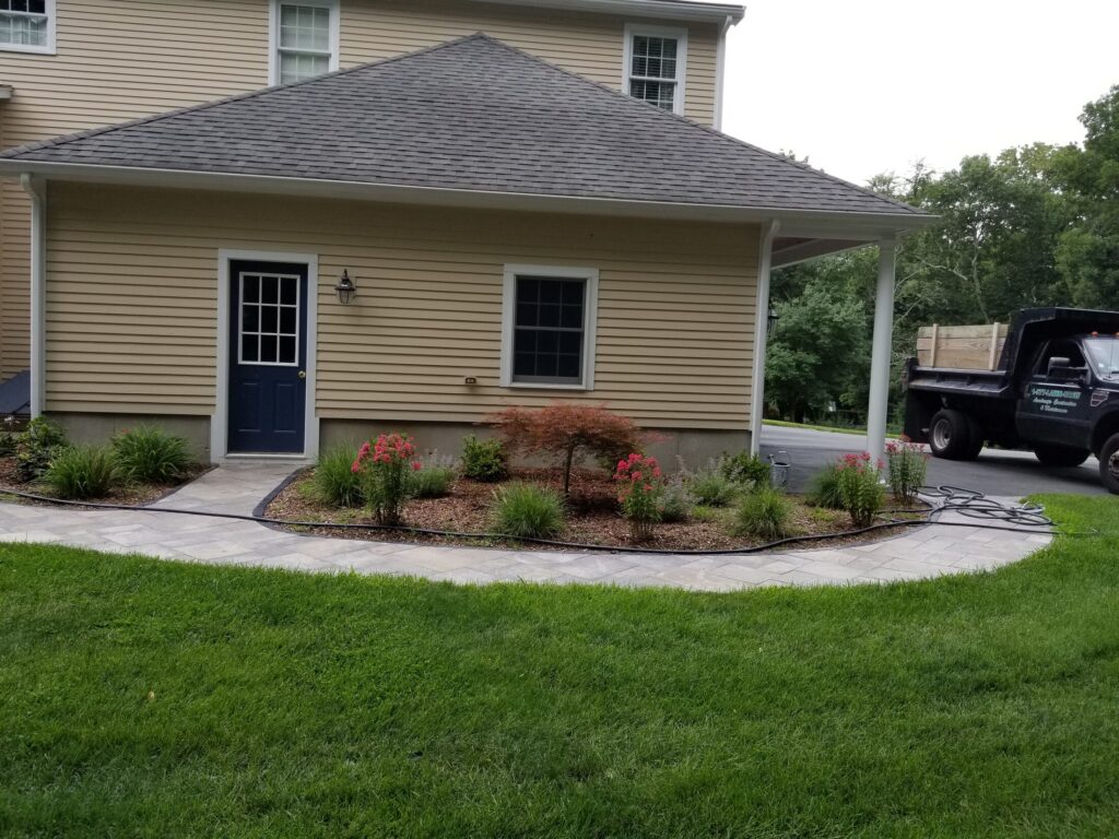 Curved Easton walkway connecting the patio to the home