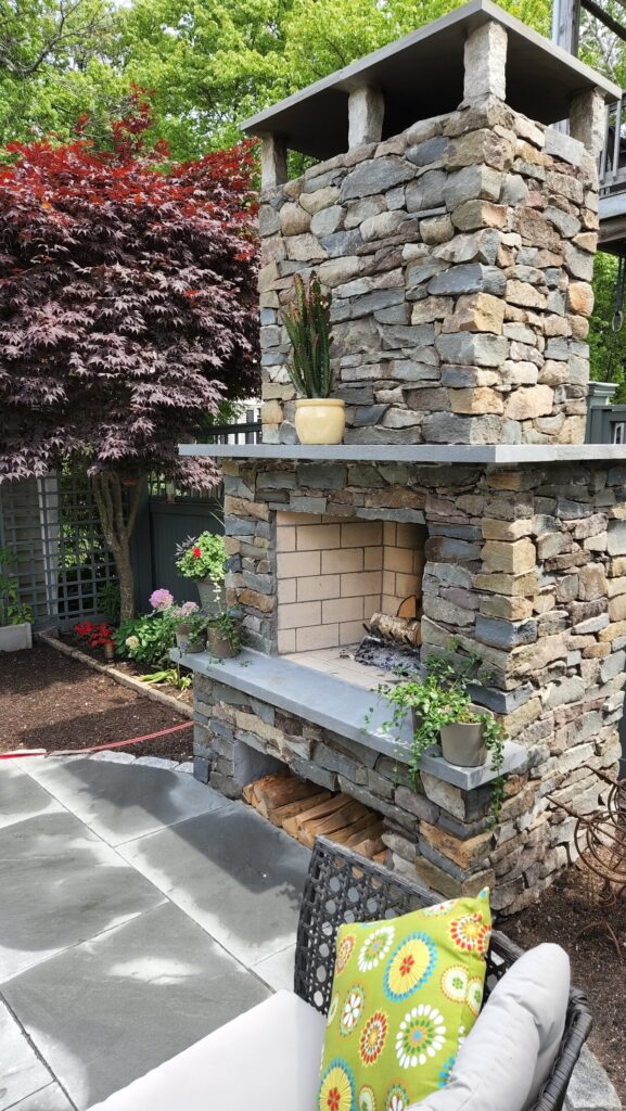 Vertical detail of the natural-stone fireplace in Wollaston